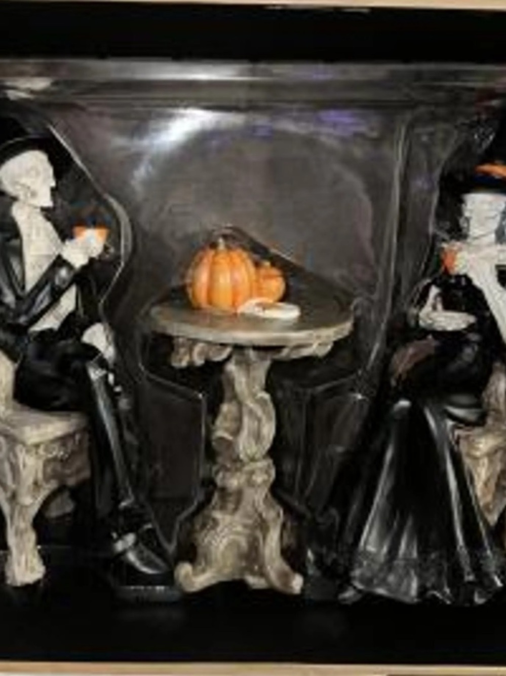 Skeletons drinking coffee